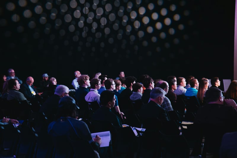 Group of people at the NTEN annual conference in a lecture hall for the opening keynote